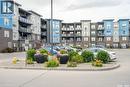 404 5301 Universal Crescent, Regina, SK  - Outdoor With Balcony With Facade 