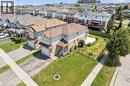 Two-story residential property featuring a brick and siding exterior - 71 Peach Blossom Crescent, Kitchener, ON 