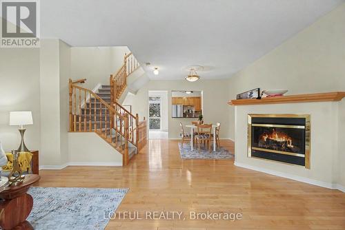 68 Metropole Private, Ottawa, ON - Indoor Photo Showing Living Room With Fireplace