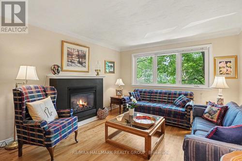 657 Golden Avenue, Ottawa, ON - Indoor Photo Showing Living Room With Fireplace