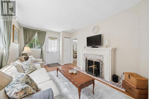 10 Macville Avenue, Kitchener, ON - Indoor Photo Showing Living Room With Fireplace