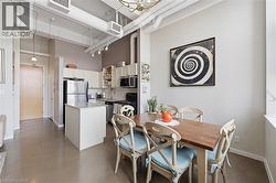 Open Concept Dining and Kitchen filled with natural sunlight. - 