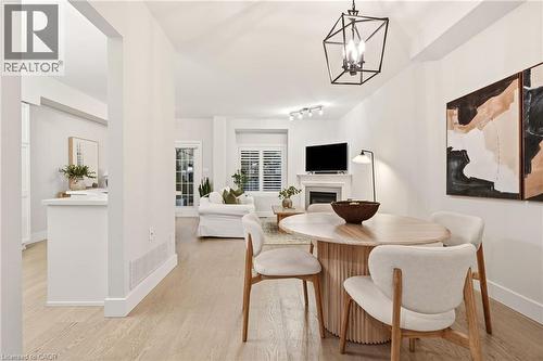 1361 Stephenson Drive, Burlington, ON - Indoor Photo Showing Dining Room With Fireplace
