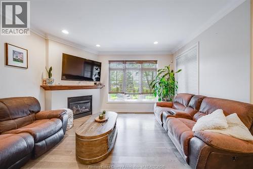 205 Whisper Creek Circle, Tecumseh, ON - Indoor Photo Showing Living Room With Fireplace