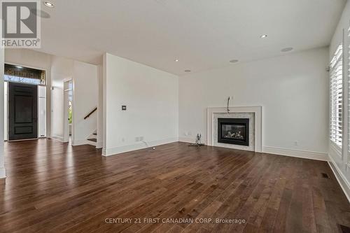 569 Eclipse Walk, London North (North B), ON - Indoor Photo Showing Living Room With Fireplace