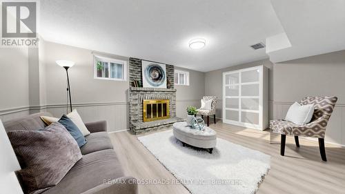 70 Halfmoon Square, Toronto, ON - Indoor Photo Showing Living Room With Fireplace
