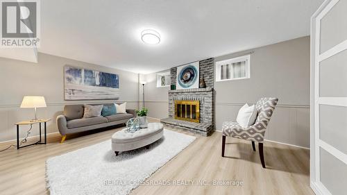 70 Halfmoon Square, Toronto, ON - Indoor Photo Showing Living Room With Fireplace
