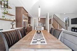 Dining room featuring recessed lighting and light wood finished floors - 