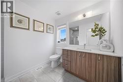 Full bath with a stall shower and vanity - 