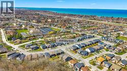 Aerial view of property's location featuring a nearby body of water - 