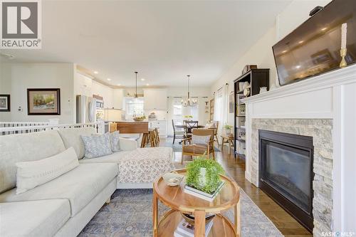 621 Braun Lane, Warman, SK - Indoor Photo Showing Living Room With Fireplace
