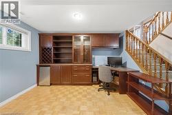 Custom built-in cabinetry with a dedicated wine rack and beverage refrigerator - 