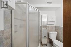 Frosted glass shower enclosure with white trim - 