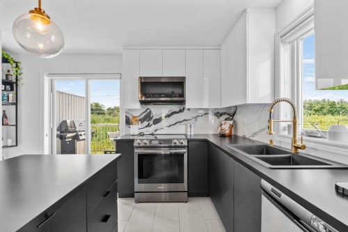 Cuisine - 433 Place Du Louvre, Mascouche, QC - Indoor Photo Showing Kitchen With Double Sink With Upgraded Kitchen