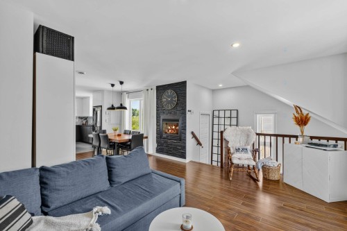 Salon - 433 Place Du Louvre, Mascouche, QC - Indoor Photo Showing Living Room With Fireplace