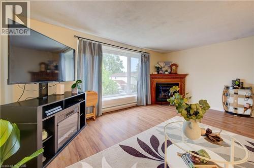 175 Elm Ridge Drive Unit# 38, Kitchener, ON - Indoor Photo Showing Living Room With Fireplace