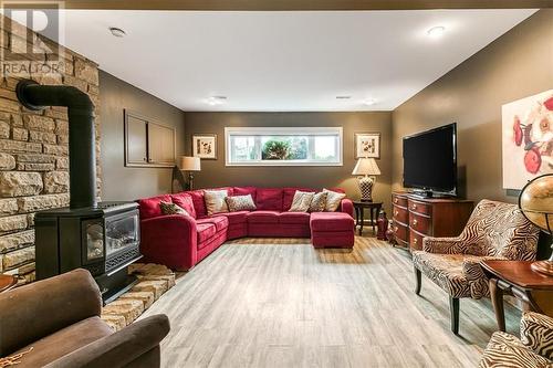 33 Oak, Capreol, ON - Indoor Photo Showing Living Room With Fireplace