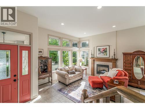 4122 Gallaghers Boulevard S, Kelowna, BC - Indoor Photo Showing Living Room With Fireplace