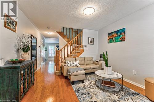 Hardwood-finish flooring throughout the main level - 4057 Donnic Drive, Burlington, ON - Indoor Photo Showing Living Room
