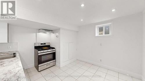 104 Otonabee Avenue, Toronto, ON - Indoor Photo Showing Kitchen With Double Sink
