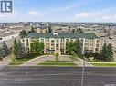 209 215 Lowe Road, Saskatoon, SK  - Outdoor With Facade 