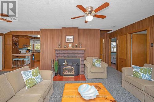Wood burning Stove - 1012 Armstrong Road, Gravenhurst, ON - Indoor Photo Showing Living Room With Fireplace