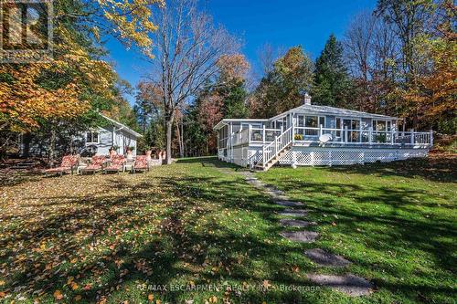 Large .79 acre property - 1012 Armstrong Road, Gravenhurst, ON - Outdoor With Deck Patio Veranda