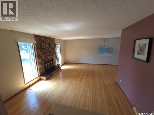 2509 Taylor Street, Saskatoon, SK - Indoor Photo Showing Living Room With Fireplace