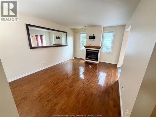1484 Border, Tecumseh, ON - Indoor Photo Showing Living Room With Fireplace