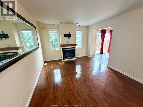 1484 Border, Tecumseh, ON - Indoor Photo Showing Living Room With Fireplace