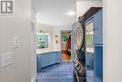 Laundry tucked in the main bath - 