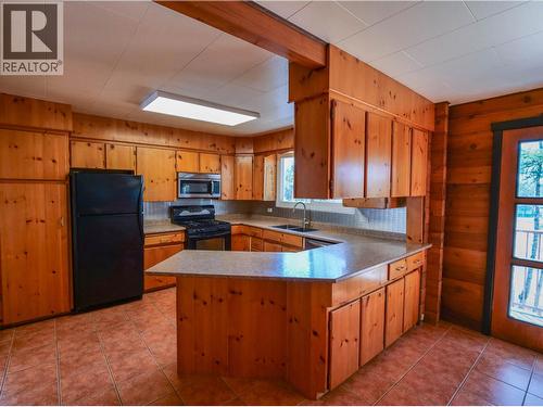182 S Coach Road, Quesnel, BC - Indoor Photo Showing Kitchen With Double Sink