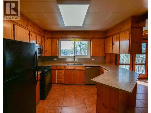 182 S Coach Road, Quesnel, BC - Indoor Photo Showing Kitchen With Double Sink