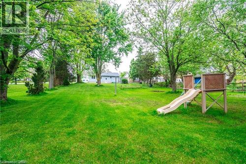 Expansive green lawn with mature trees providing ample shade - 2583 Binbrook Road, Binbrook, ON - Outdoor
