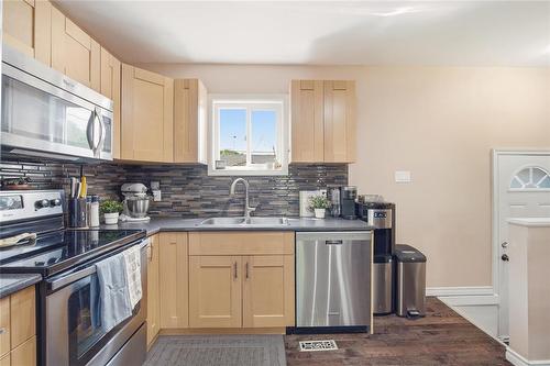 803 Day Street, Winnipeg, MB - Indoor Photo Showing Kitchen With Double Sink