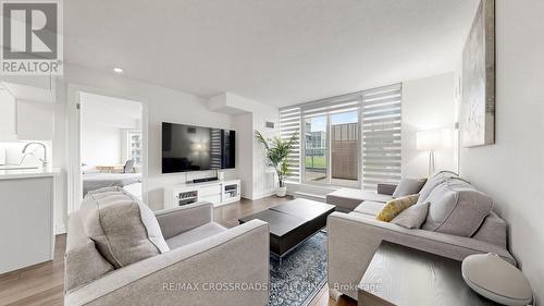 656 - 23 Cox Boulevard, Markham, ON - Indoor Photo Showing Living Room