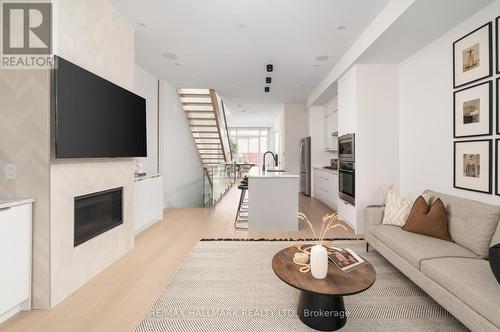 167 Sammon Avenue, Toronto, ON - Indoor Photo Showing Living Room With Fireplace