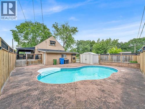 4891 Seminole, Windsor, ON - Outdoor With In Ground Pool With Backyard