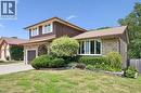 Multi-level residence featuring a brick facade with brown siding accents - 8 Perin Place, Kitchener, ON  - Outdoor 