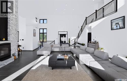 Ad Acreage, Corman Park Rm No. 344, SK - Indoor Photo Showing Living Room With Fireplace