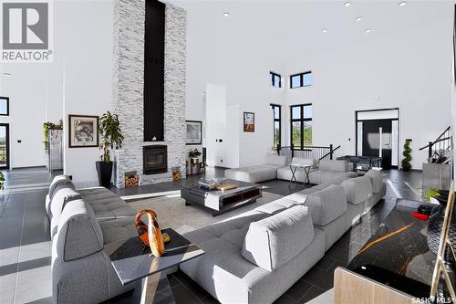 Ad Acreage, Corman Park Rm No. 344, SK - Indoor Photo Showing Living Room With Fireplace