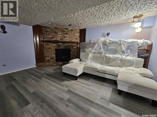 1641 103Rd Street, North Battleford, SK - Indoor Photo Showing Living Room With Fireplace