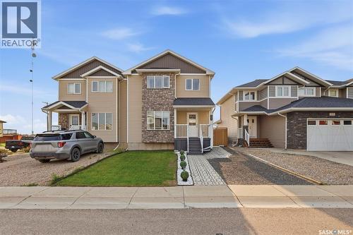 503 Maple Crescent, Warman, SK - Outdoor With Facade
