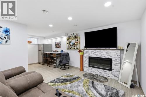 503 Maple Crescent, Warman, SK - Indoor Photo Showing Living Room With Fireplace
