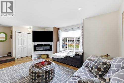 503 Maple Crescent, Warman, SK - Indoor Photo Showing Living Room With Fireplace
