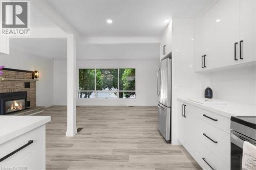 345 Berkindale Drive, Hamilton, ON - Indoor Photo Showing Kitchen With Fireplace