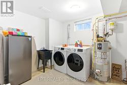 Washer and dryer in lower level. - 