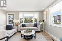 Lots of natural light in the living room. - 