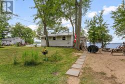 Back of the cottage w/ a parking spot to unload - 