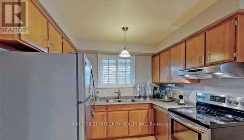 Main - 61 Chartland Boulevard S, Toronto, ON - Indoor Photo Showing Kitchen With Double Sink